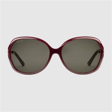 round gold metal burgundy sunglasses